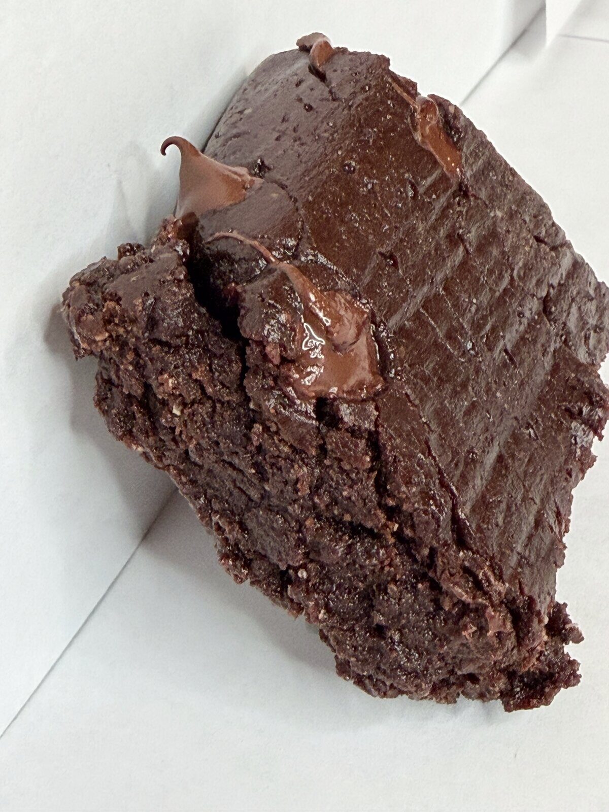 Close-up of a fudgy LifeMaxx protein brownie