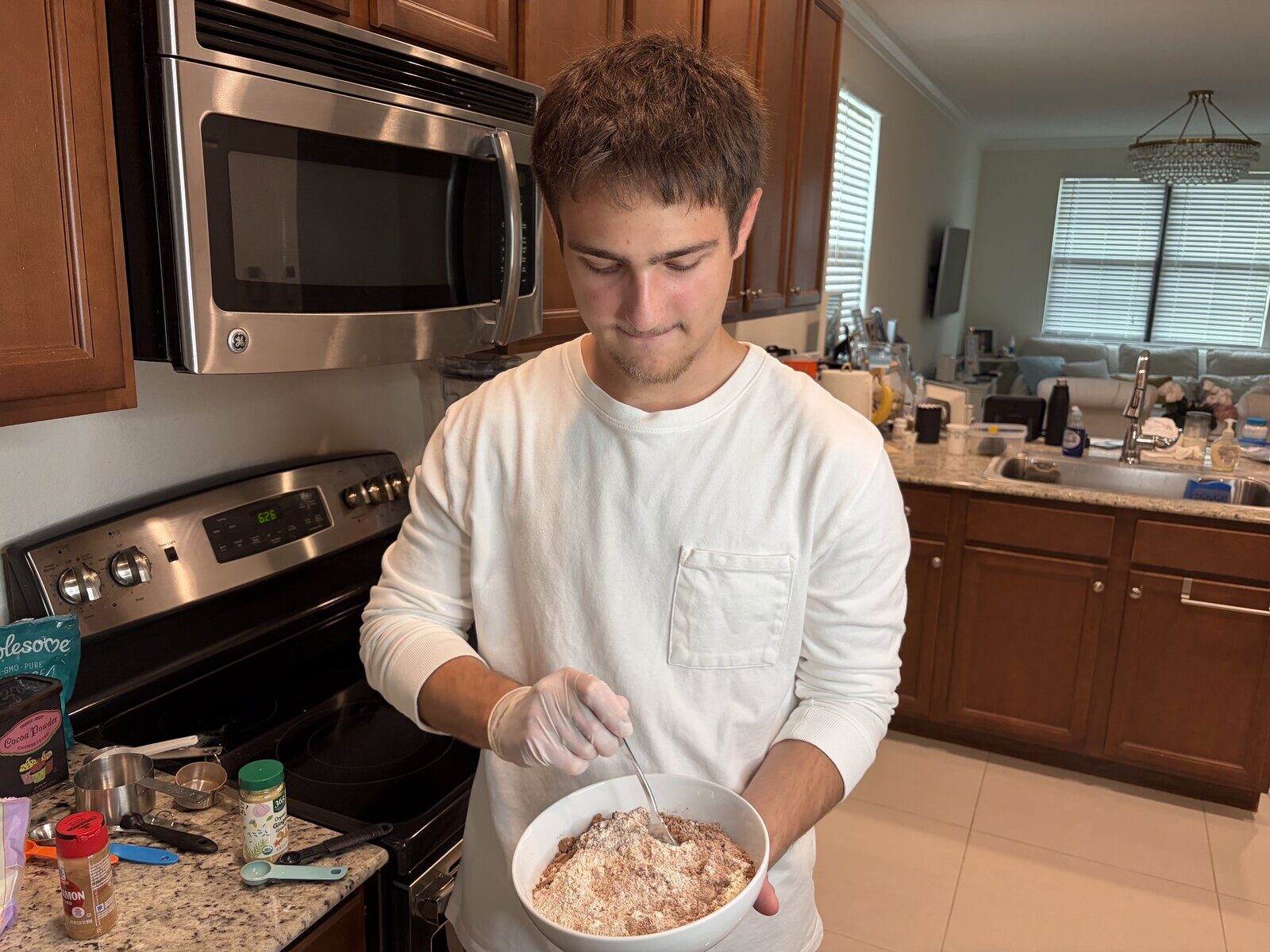Mixing brownie batter by hand in the kitchen